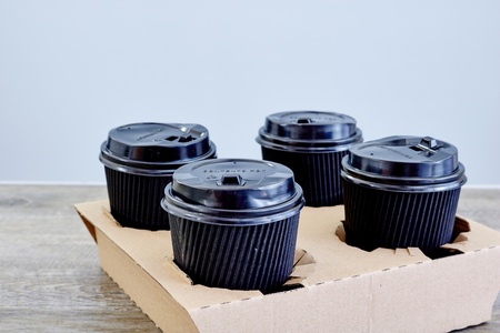 A studio photo of a takeaway coffee holderの写真素材