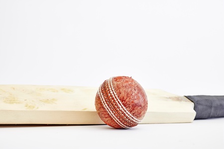 A studio photo of cricket gear on grassの写真素材