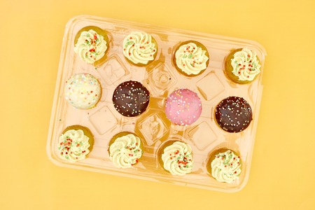 A studio photo of baby cup cakesの写真素材