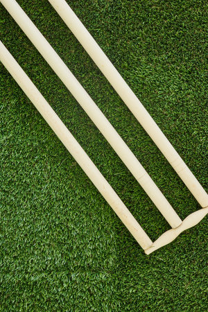 A studio photo of cricket gear on grassの写真素材