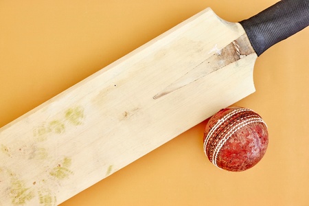 A studio photo of cricket gear on grassの写真素材