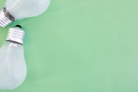 A studio photo of a screw in light bulbの写真素材