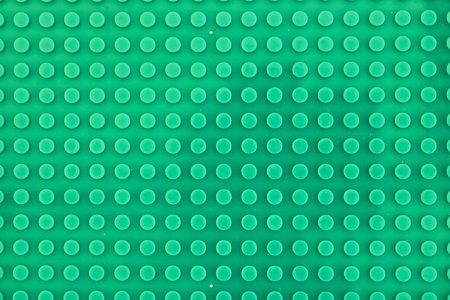 A studio photo of a block building baseの写真素材