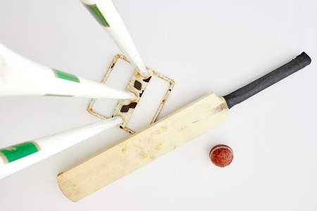 A studio photo of cricket gear on grassの写真素材