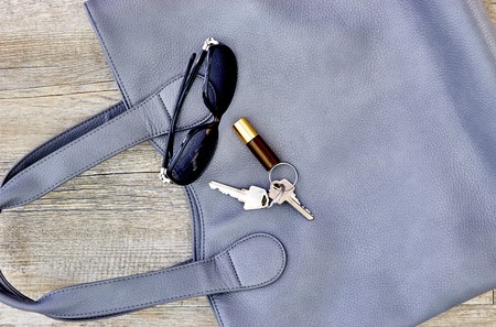 A studio photo of a ladies grey handbagの写真素材