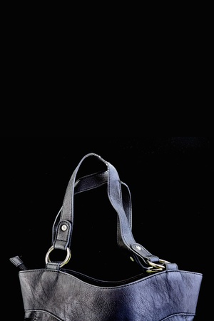 A studio photo of a ladies black hand bagの写真素材