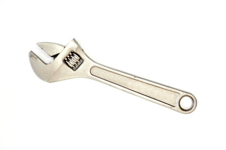 A studio photo of a wrench on a white background