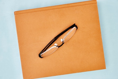 A studio photo of black reading glassesの写真素材