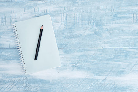 A studio shot of a notebook writing pad
