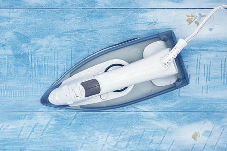 A studio photo of ironing and laundry itemsの写真素材