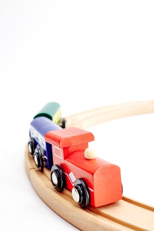 A studio photo of a wooden train trackの写真素材