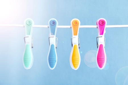 A studio photo of clothes line pegsの写真素材