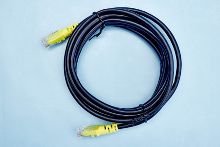 A studio photo of an ethernet cable