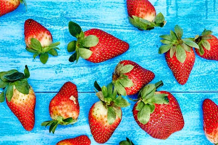 A studio photo of fresh strawberriesの写真素材