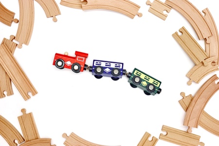 A studio photo of a wooden train trackの写真素材