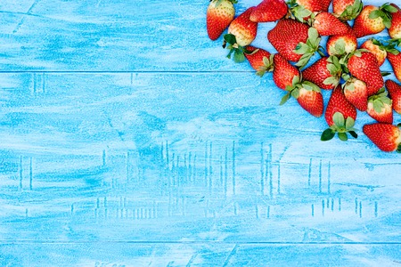 A studio photo of fresh strawberriesの写真素材