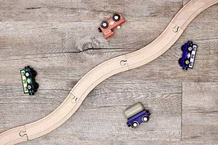 A studio photo of a wooden train trackの写真素材