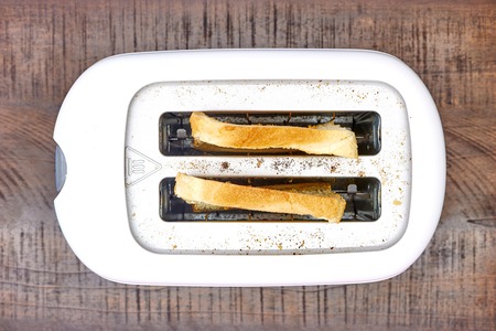 A studio photo of a white toasterの写真素材