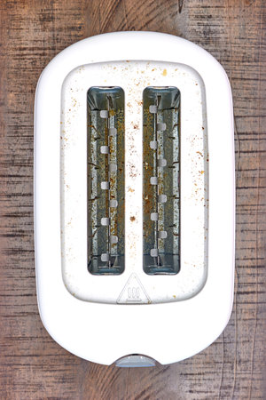 A studio photo of a white toaster