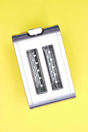 A studio photo of a white toasterの写真素材