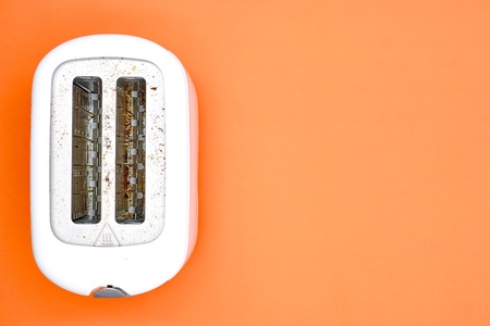 A studio photo of a white toasterの写真素材