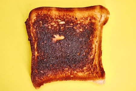 A studio photo of burnt toastの写真素材
