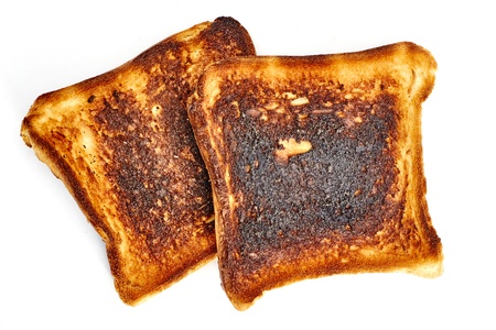 A studio photo of burnt toastの写真素材