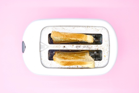 A studio photo of a white toasterの写真素材