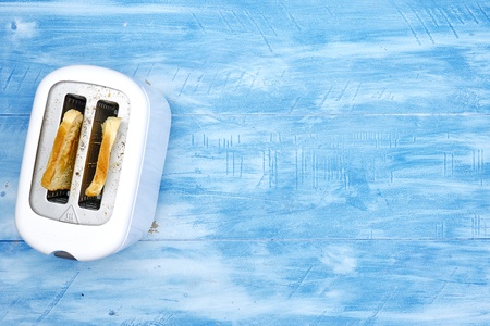 A studio photo of a white toasterの写真素材