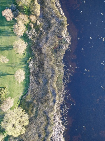 A aerial drone image of a lakeの写真素材