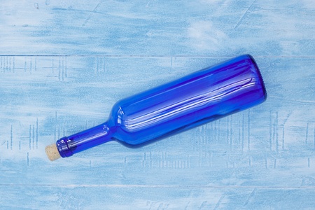 A studio photo of a blue bottleの写真素材