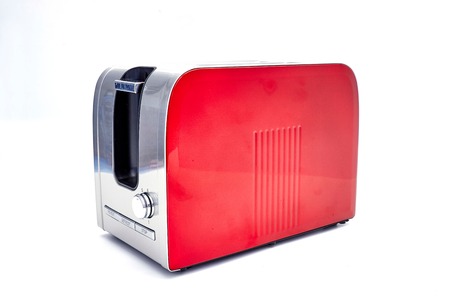 A studio photo of a white toasterの写真素材