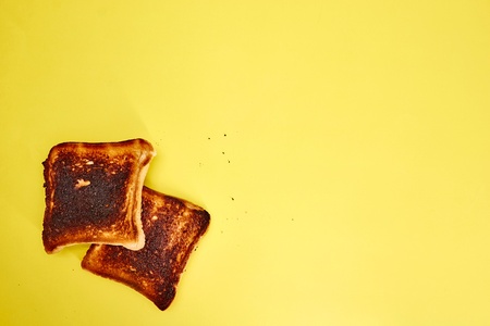 A studio photo of burnt toastの写真素材
