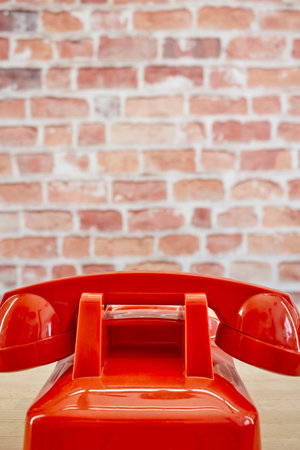 A studio photo of a rotary telephoneの写真素材