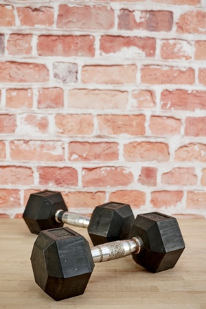 A studio photo of gym dumbellsの写真素材