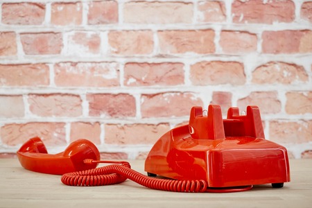 A studio photo of a rotary telephoneの写真素材