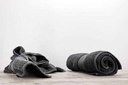 A studio photo of a black bathing towelの写真素材