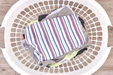 A studio photo of a laundry Basketの写真素材