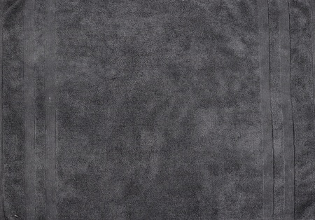 A studio photo of a black bathing towelの写真素材