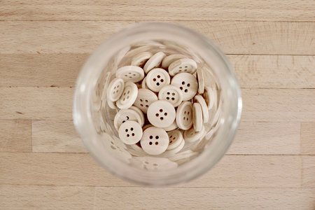 A studio photo of wooden buttons