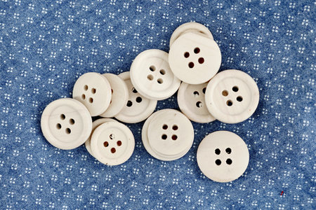 A studio photo of wooden buttons