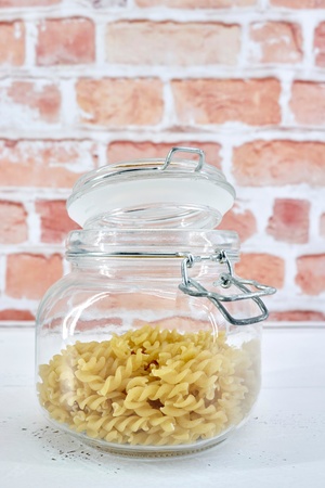 A studio photo of dry pasta noodlesの写真素材