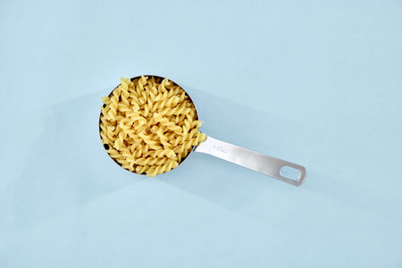 A studio photo of dry pasta noodles