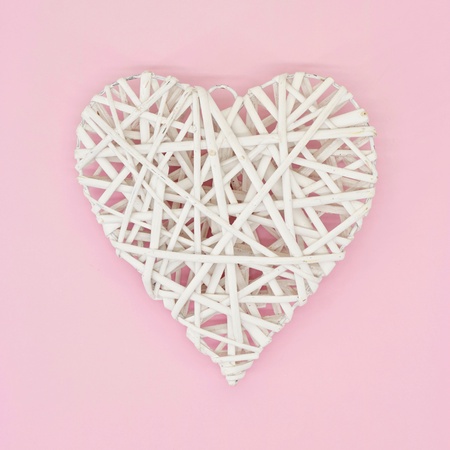 A studio photo of a wicker love heartの写真素材