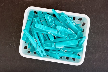 A studio photo of clothes line pegsの写真素材