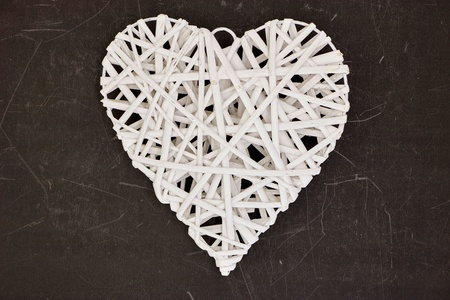 A studio photo of a wicker love heartの写真素材