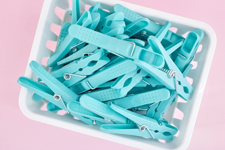 A studio photo of clothes line pegsの写真素材