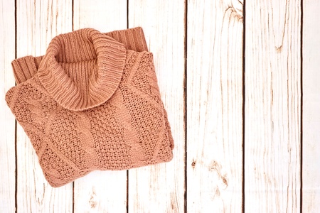 A studio photo of a woolen jumperの写真素材