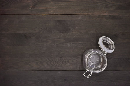 A studio photo of a glass jar