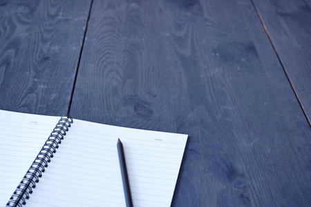 A studio photo of a note book pad